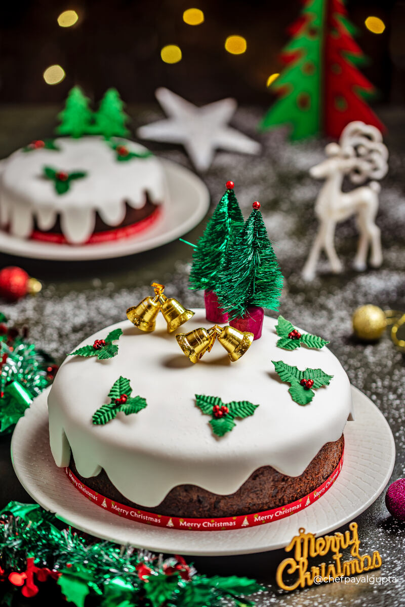 Christmas cake is an English tradition that began as plum porridge. A traditional English Christmas Cake is made with rich, moist currants, sultanas (golden raisins) and raisins which have been soaked in rum